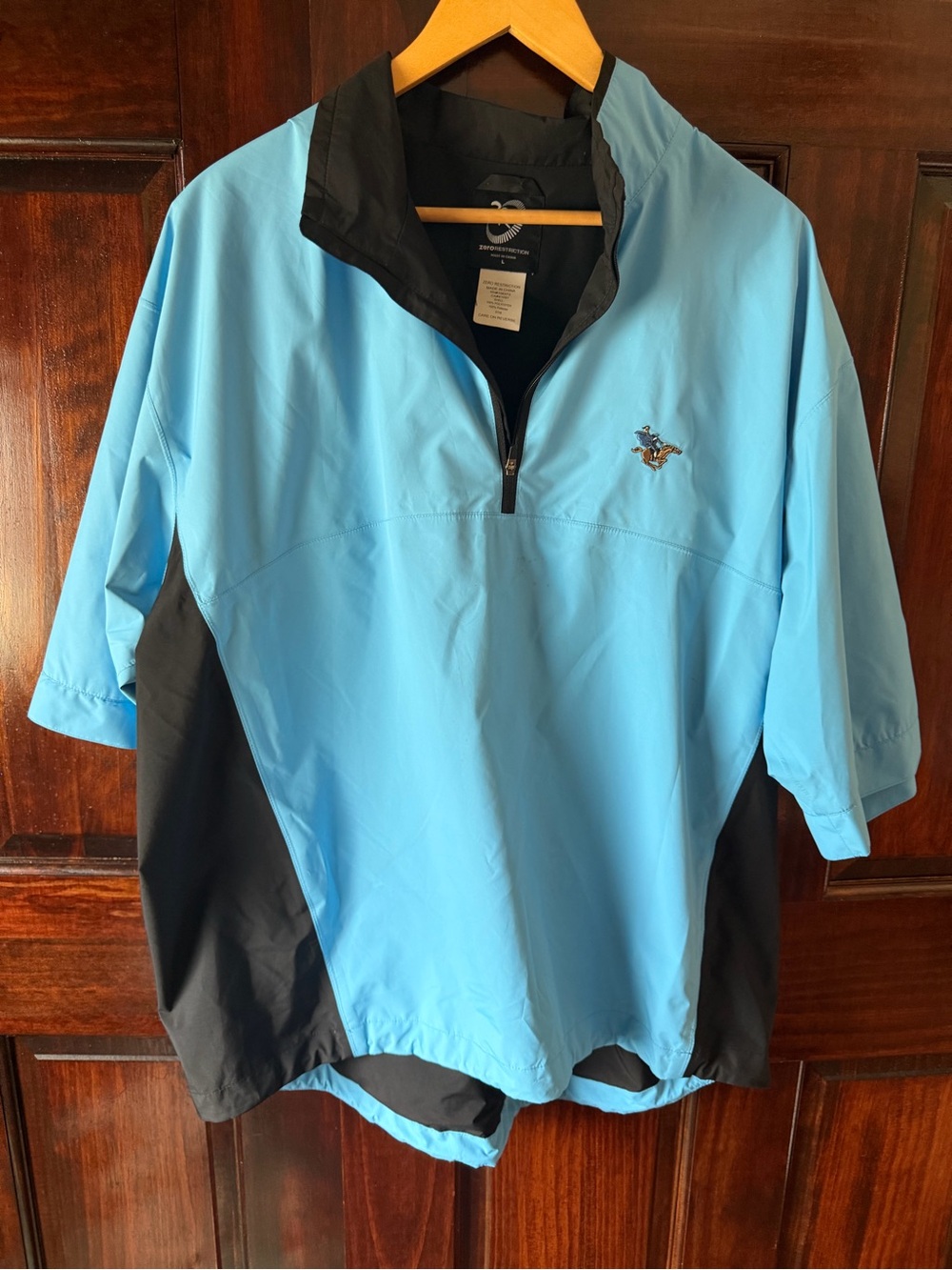 Sleepy Hollow CC. Light Blue & Black Quarter-Zip Windbreaker pullover.